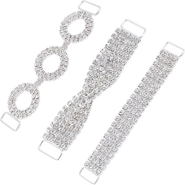 

PandaHall Fingerinspire 3Pcs 3 style Brass Rhinestone Links Connectors, Garment Accessories, Crystal, Rectangle & Ring & Twsited, Silver..., Clear
