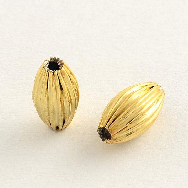 

PandaHall Brass Corrugated Beads, Barrel, Golden, 10.5x6mm, Hole: 2mm Brass Oval