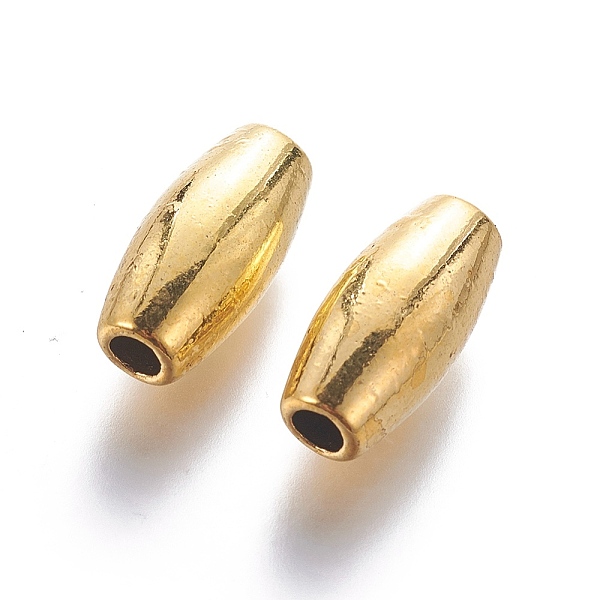 

PandaHall Tibetan Style Alloy Rice Beads, Lead Free and Cadmium Free, Antique Golden, about 17mm long, 8mm wide, 7mm thick, hole: 3.5mm...