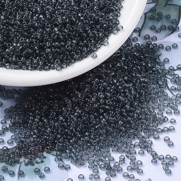 

PandaHall MIYUKI Round Rocailles Beads, Japanese Seed Beads, (RR152) Transparent Gray, 11/0, 2x1.3mm, Hole: 0.8mm, about 1100pcs/bottle...