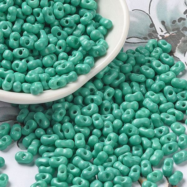 

PandaHall Baking Paint Glass Seed Beads, Peanut, Turquoise, 5.5~6x3~3.5x3mm, Hole: 1~1.2mm, about 4000pcs/pound Glass Peanut Green