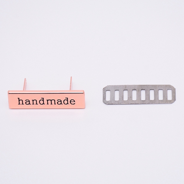 

PandaHall Zinc Alloy Bag Lock Catch Clasps, with Iron Base, Rectangle with Word handmade, Rose Gold, 1x3.65x1.65cm, 3.4x1.2x0.02mm, 2pcs/set...