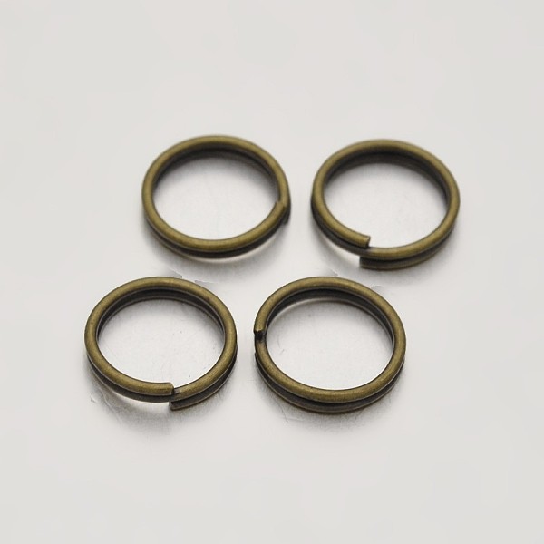 

PandaHall Brass Split Rings, Double Loops Jump Rings, Antique Bronze, 8mm, Hole: 1mm, about 7mm inner diameter, about 3180pcs/500g Brass...