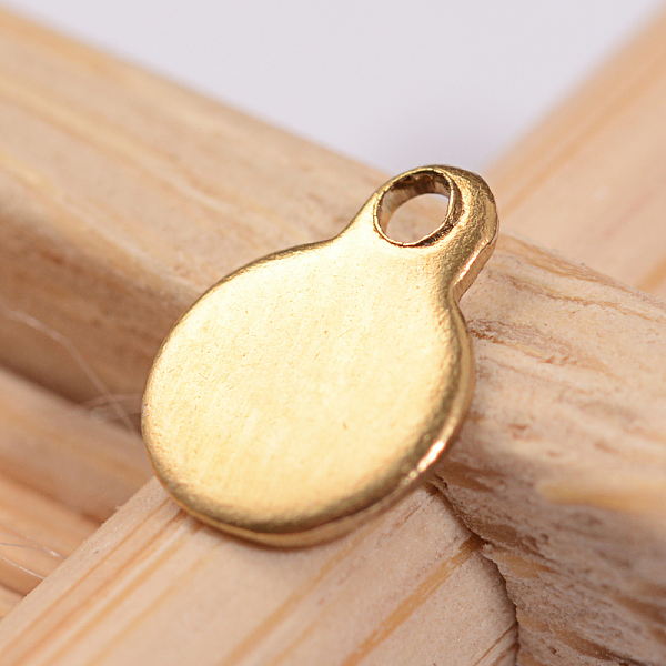 

PandaHall Ion Plating(IP) 304 Stainless Steel Pendant End Piece, Blank Stamping Tag, Flat Round, Golden, 9x7x1mm, Hole: 1mm 304 Stainless...