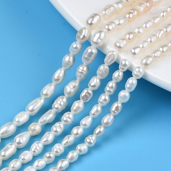 

PandaHall Natural Cultured Freshwater Pearl Beads Strands, Rice, Seashell Color, 4~7.5x3~4mm, Hole: 0.6mm, about 63~64pcs/strand, 13.58 inch...
