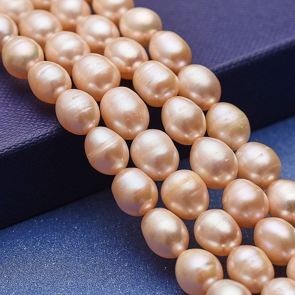 

PandaHall Natural Cultured Freshwater Pearl Beads Strands, Potato, Bisque, 8~10x7~8mm, Hole: 0.5mm, about 40~41pcs/strand, 14.76~15.15 inch..., Orange