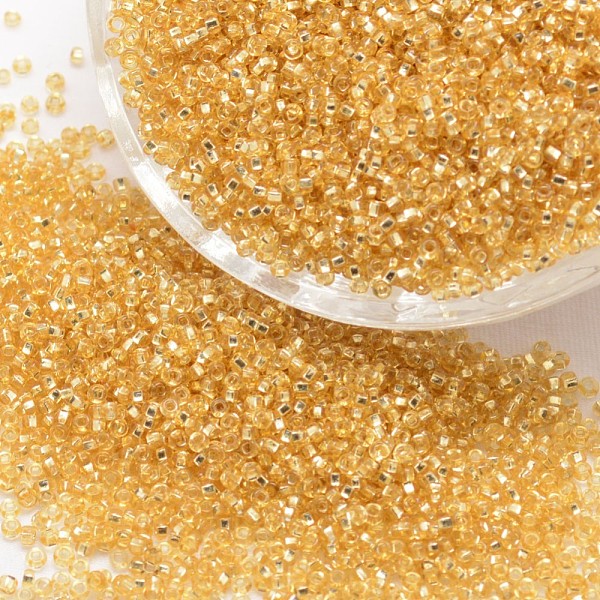 

PandaHall 6/0 Round Glass Seed Beads, Silver Lined Square Hole, Transparent Colours, Goldenrod, 3.6~4.0mm, Hole: 1.2mm, about 555pcs/50g..., Gold