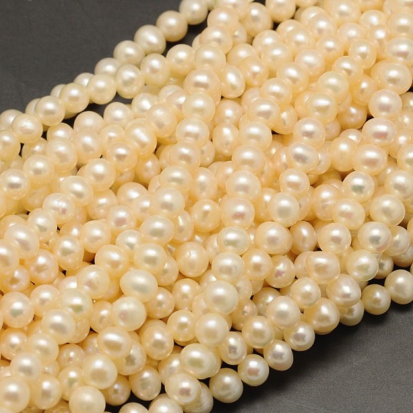 

PandaHall Natural Cultured Freshwater Pearl Beads Strands, Round, Beige, 5~6mm, Hole: 0.8mm, about 65~67pcs/strand, 14.9 inch Pearl Round..., Yellow
