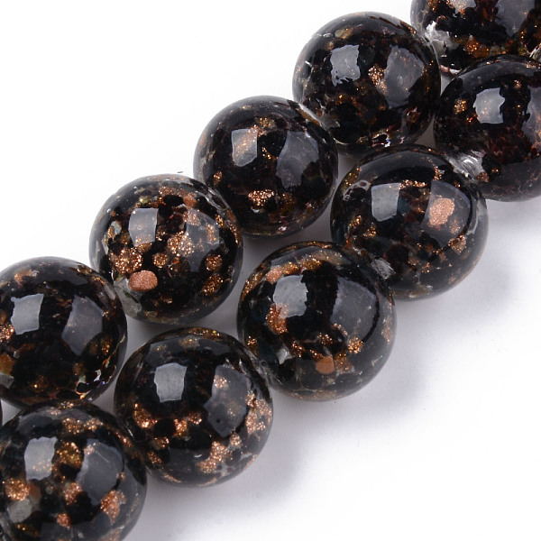 

PandaHall Handmade Gold Sand Lampwork Beads, Inner Flower, Round, Black, 20x19~20mm, Hole: 2mm, about 20pcs/strand, 14.96 inch(38cm)...