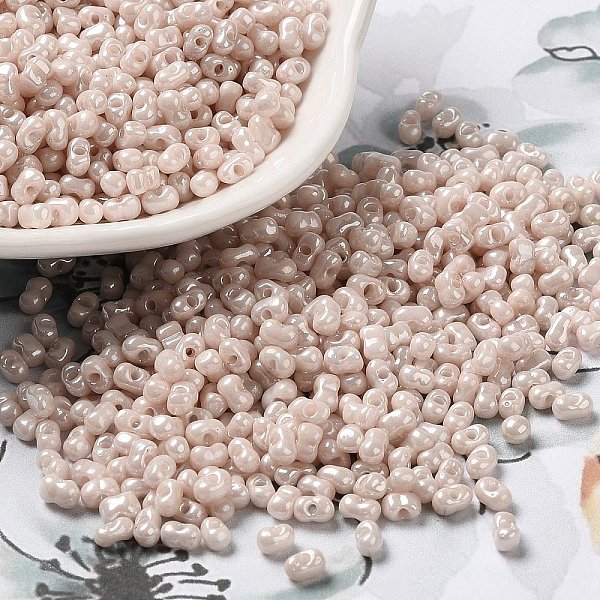 

PandaHall Glass Seed Beads, Peanut, Antique White, 3.5~4x2~2.5x2~2.3mm, Hole: 0.8mm, about 8000pcs/pound Glass Peanut
