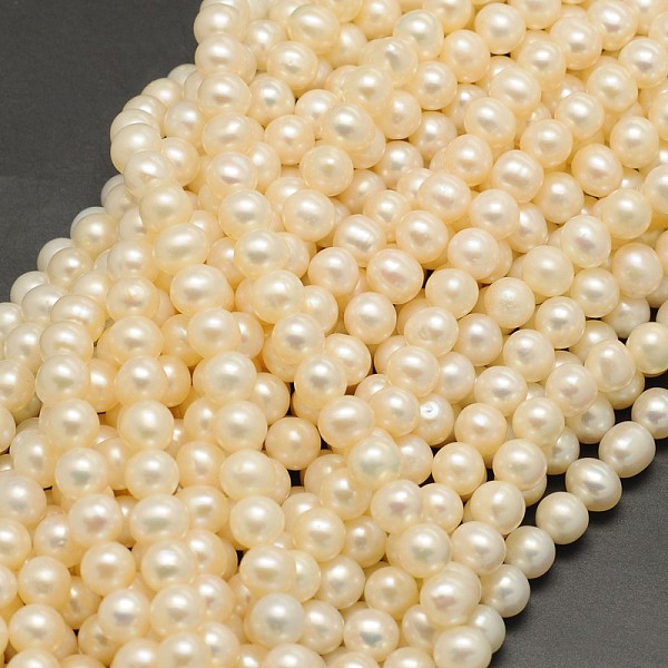 

PandaHall Natural Cultured Freshwater Pearl Beads Strands, Round, Beige, 6~6.5mm, Hole: 0.8mm, about 68pcs/strand, 15.5 inch Pearl Round..., Yellow