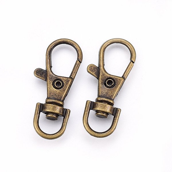 

PandaHall Tibetan Style Alloy Swivel Clasps, Antique Bronze, 37.5x15x6mm, Hole: 7x8mm Alloy