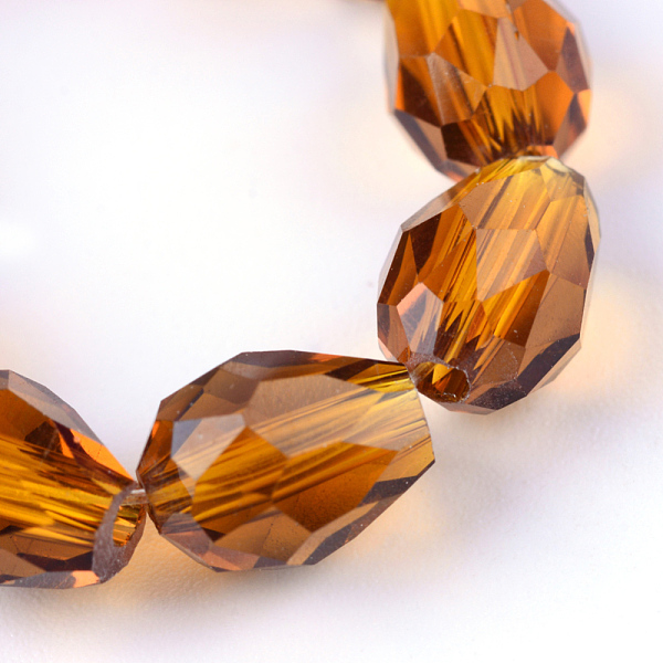 

PandaHall Transparent Glass Bead Strands, Faceted Teardrop, Chocolate, 8x6mm, Hole: 1mm, about 65pcs/strand, 17.99 inch(45.7cm) Glass..., Brown