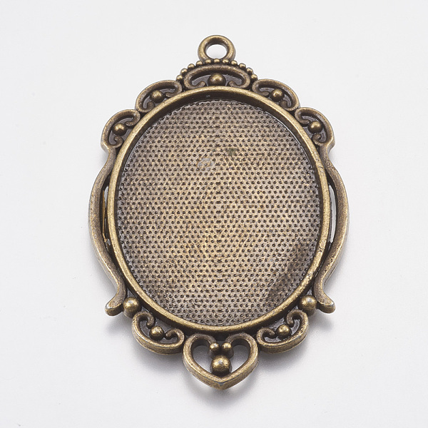 

PandaHall Tibetan Style Pendant Cabochon Settings, Cadmium Free & Nickel Free & Lead Free, Oval, Antique Bronze, 62x39x3mm, Hole: 2.5mm...
