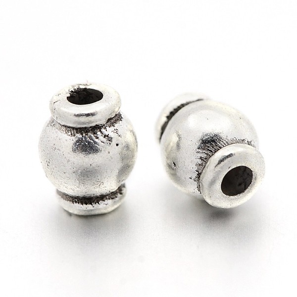 

PandaHall Tibetan Style Alloy Beads, Lead Free and Cadmium Free, Drum, Antique Silver Color, about 5mm in diameter, 6.5mm long, hole: 2mm...