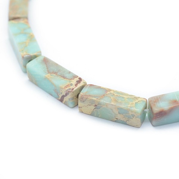 

PandaHall Natural Imperial Jasper Beads Strands, Dyed, Rectangle, Light Cyan, 13.5~14x4~4.5x4~4.5mm, Hole: 1mm, about 28pcs/strand, 15.15...