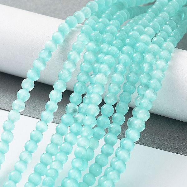 

PandaHall Cat Eye Beads Strands, Round, Cyan, 4mm, Hole: 0.7mm, about 100~105pcs/strand, 14.37~14.69 inch(36.5~37.3cm) Glass Round Cyan