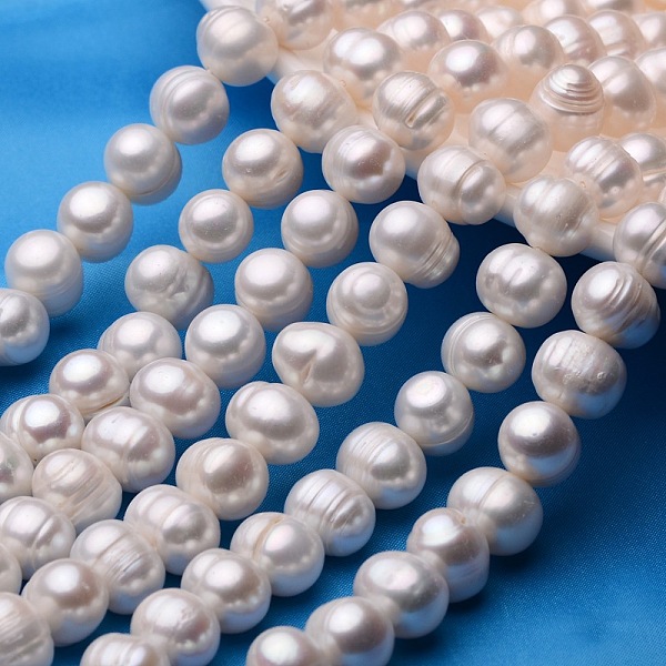 

PandaHall Potato Natural Cultured Freshwater Pearl Beads Strands, Antique White, 11~12mm, Hole: 0.8mm, about 33~38pcs/strand, 13.7 inch~15.7..., Orange