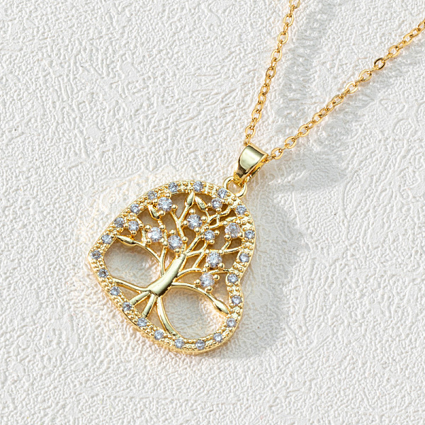 

PandaHall 18K Gold Plated Tree of Life Pendant Necklace with CZ Stones Circle Cutout, Clear, size 2 Brass Tree Clear