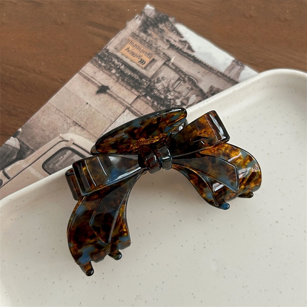 

PandaHall Cellulose Acetate & Iron Claw Hair Clips, Hair Accessories for Women & Girls, Bowknot, Saddle Brown, 56x91x55mm Cellulose Acetate...