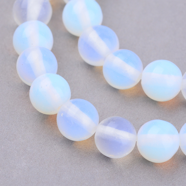 

PandaHall Opalite Beads Strands, Round, 6~6.5mm, Hole: 1mm, about 63pcs/strand, 14.7 inch Opalite Round
