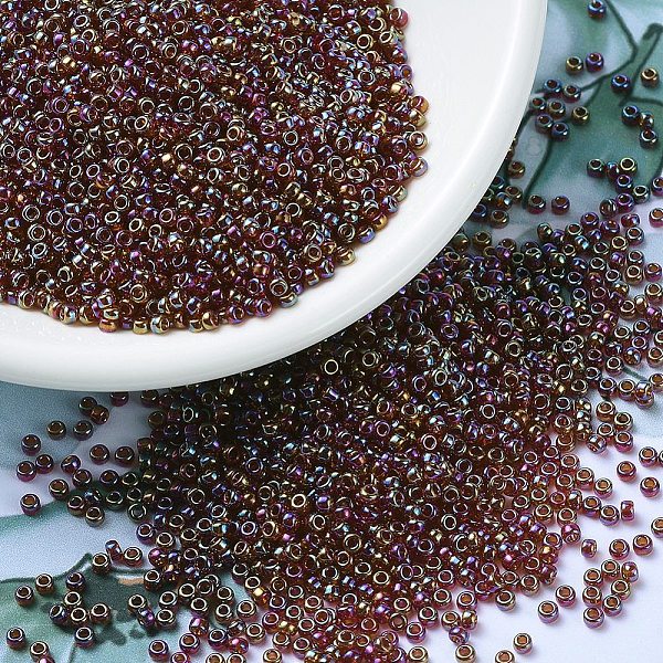 

PandaHall MIYUKI Round Rocailles Beads, Japanese Seed Beads, 11/0, (RR2461) Transparent Dark Topaz AB, 2x1.3mm, Hole: 0.8mm, about..., Brown