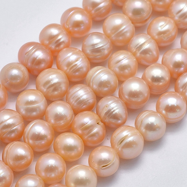 

PandaHall Natural Cultured Freshwater Pearl Beads Strands, Potato, Light Salmon, 9~11x8~9mm, Hole: 0.8mm, about 41~43pcs/strand, 14 inch...