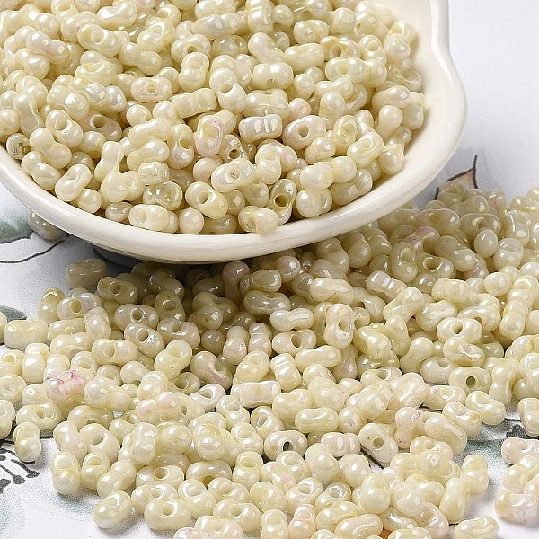 

PandaHall Glass Seed Beads, Peanut, Light Goldenrod Yellow, 5.5~6x3~3.5x3mm, Hole: 1~1.2mm, about 4000pcs/pound Glass Peanut