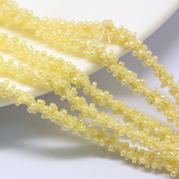 

PandaHall Seed Bead Cords, with Polyester Cords, 6-Ply, Round Hole, Champagne Yellow, 6mm, about 32.8 yards(30m)/bundle Seed Beads Yellow