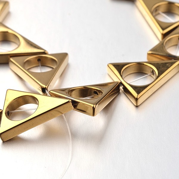 

PandaHall Electroplate Non-magnetic Synthetic Hematite Bead Strands, Triangle, Golden Plated, 17x15x3mm, Hole: 1mm, about 24pcs/strand, 15.7...