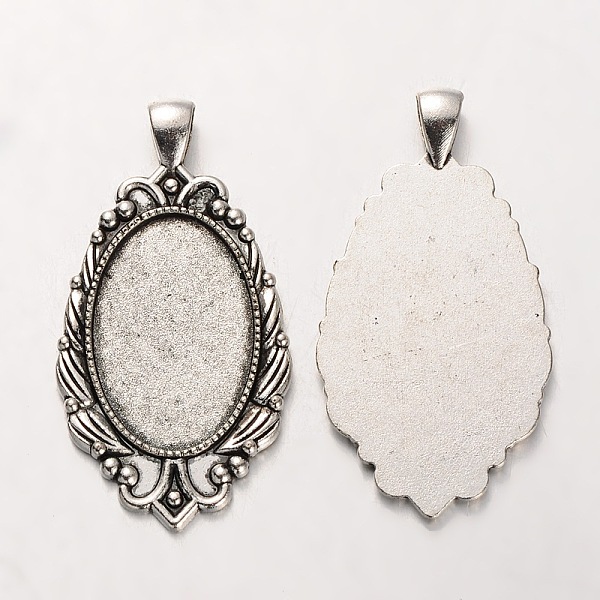 

PandaHall Tibetan Style Alloy Oval Pendant Cabochon Settings, Cadmium Free & Lead Free, Antique Silver, 55x29x2mm, Hole: 5x7mm, Tray...