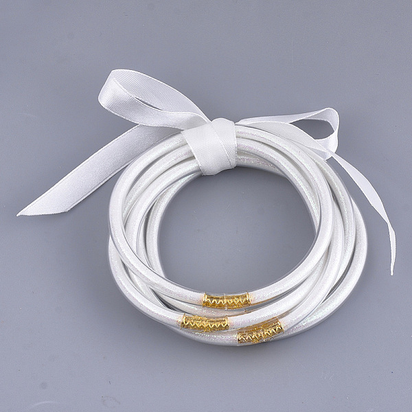 

PandaHall PVC Plastic Buddhist Bangle Sets, Jelly Bangles, with Glitter Powder and Polyester Ribbon, White, 2-1/2 inch(6.3cm), 5pcs/set...