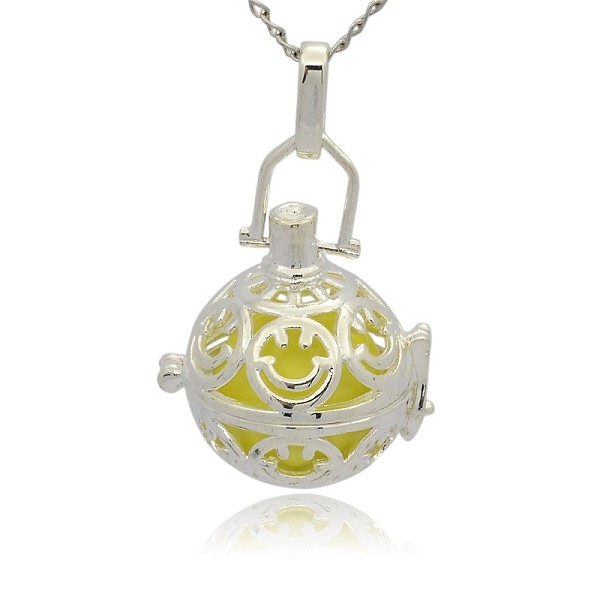

PandaHall Silver Color Plated Brass Hollow Round Cage Pendants, with No Hole Spray Painted Brass Round Ball Beads, Champagne Yellow...