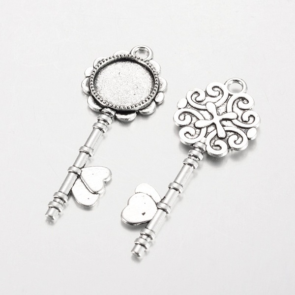 

PandaHall Tibetan Style Alloy Key Big Pendant Cabochon Settings, Cadmium Free & Lead Free, Antique Silver, Tray: 14mm, 52x20x2mm, Hole: 3mm...