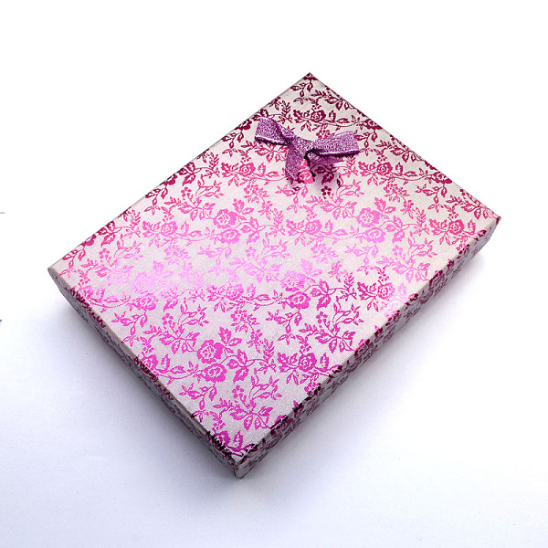 

PandaHall Rectangle Cardboard Jewelry Set Boxes, 2 Slots, with Bowknot Outside and Sponge Inside, for Rings and Earrings, Pearl Pink...