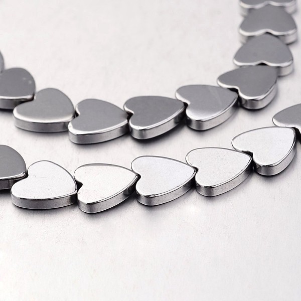 

PandaHall Electroplate Non-magnetic Synthetic Hematite Bead Strands, Heart, Silver Plated, 10x10x2mm, Hole: 1mm, about 47pcs/strand, 15.7...