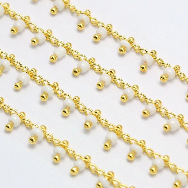 

PandaHall Brass Glass Handmade Beaded Chains, Soldered, with Spool, Cadmium Free & Nickel Free & Lead Free, Golden, White, 5.5x2mm, about...
