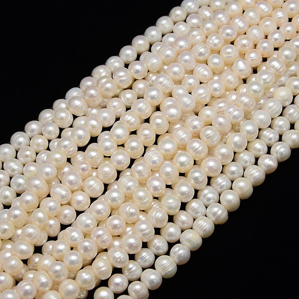 

PandaHall Natural Cultured Freshwater Pearl Beads Strands, Potato, Creamy White, 7~8mm, Hole: 0.8mm, about 46~48pcs/strand, 13.77 inch~14.17...
