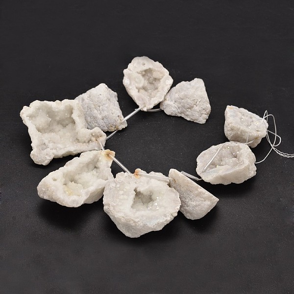 

PandaHall Nuggets Natural Druzy Geode Quartz Crystal Beads Strands, White, 38~55x48~68x18~25mm, Hole: 1mm, about 9pcs/strand, 10.5 inch...