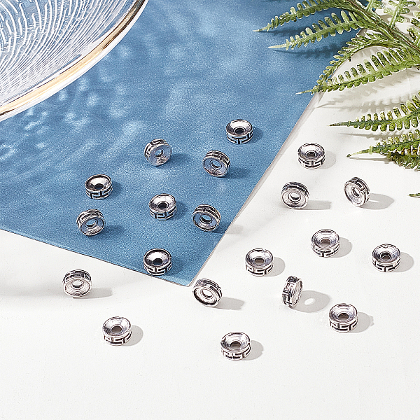 

PandaHall 100pcs Rondelle Spacer Beads, Carved Flat Round Beads Antique Silver Beads 7.5x3mm Metal Loose Beads Tibetan Style Beads for...