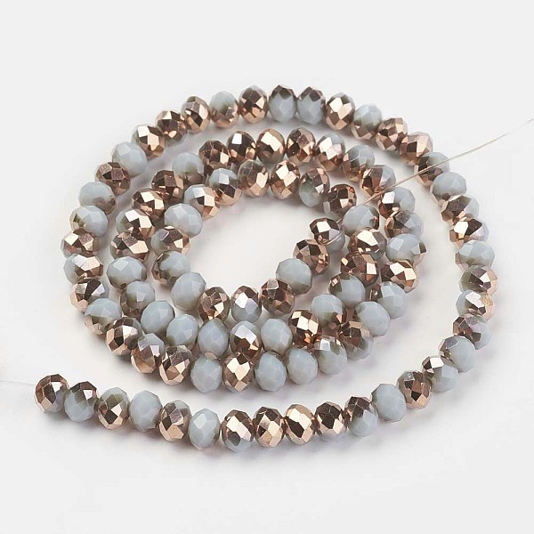 

PandaHall Electroplate Opaque Glass Beads Strands, Half Copper Plated, Faceted, Rondelle, Light Blue, 8x6mm, Hole: 1mm, about...