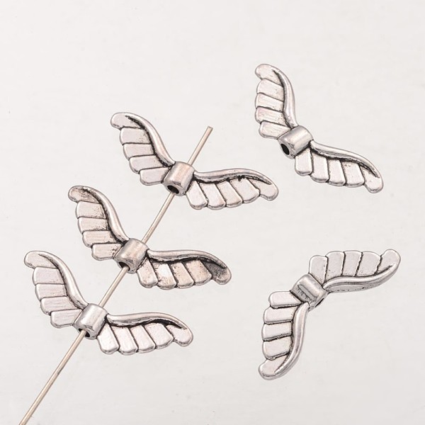 

PandaHall Wing Tibetan Style Alloy Beads, Lead Free & Nickel Free & Cadmium Free, Antique Silver, about 23mm long, 8mm wide, 2mm thick, hole...