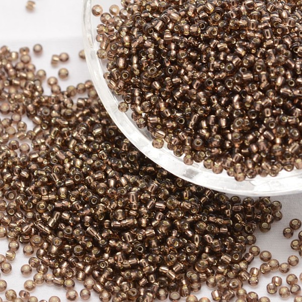 

PandaHall 6/0 Transparent Glass Round Seed Beads, Grade A, Silver Lined, Coconut Brown, 3.6~4.0mm, Hole: 1.2mm, about 500pcs/50g Glass Brown