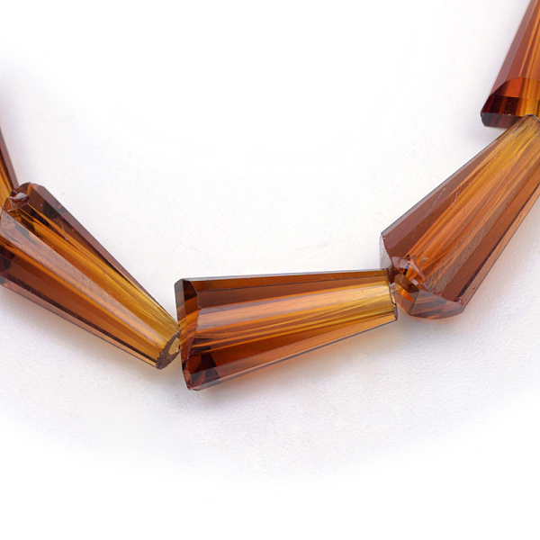 

PandaHall Transparent Glass Bead Strands, Cone, Saddle Brown, 8x4mm, Hole: 1mm, about 65~68pcs/strand, 22 inch Glass Cone Brown