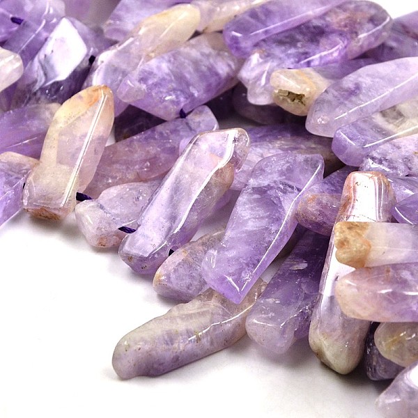 

PandaHall Irregular Strip Natural Amethyst Graduated Beads Strands, 23~62x10~12x4~6mm, Hole: 2mm, about 38pcs/strand, 15.3 inch Amethyst...