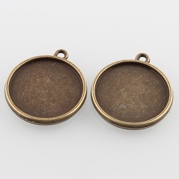 

PandaHall Vintage Flat Round Alloy Pendant Cabochon Settings, Double-sided Tray, Cadmium Free & Nickel Free & Lead Free, Antique Bronze...