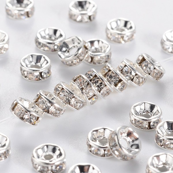 

PandaHall Brass Rhinestone Spacer Beads, Grade A, Crystal, Straight Flange, Rondelle, Silver Color Plated, 5x2.5mm, Hole: 1mm..., Clear