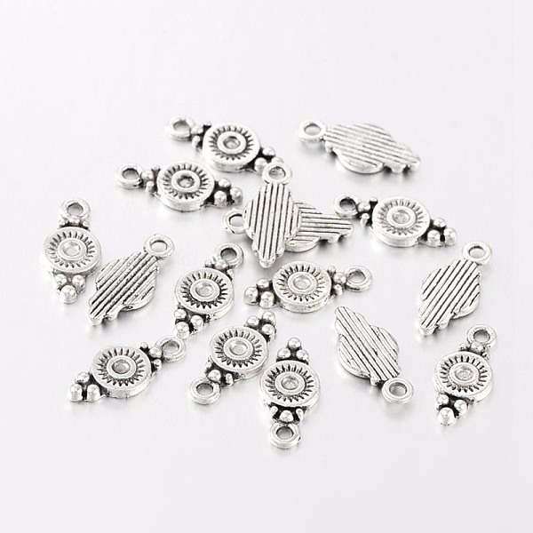 

PandaHall Tibetan Style Alloy Charms, Cadmium Free & Lead Free, Flat Round, Antique Silver, 16x7x1.5mm, Hole: 1.5mm. Alloy Round