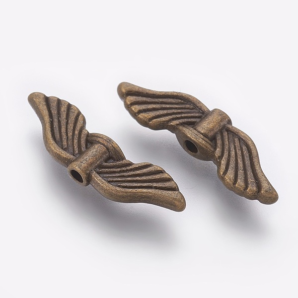 

PandaHall Tibetan Style Alloy Beads, Wing, Antique Bronze, Lead Free & Cadmium Free & Nickel Free, 21x6.5x2.5mm, Hole: 1.5mm Alloy Wing