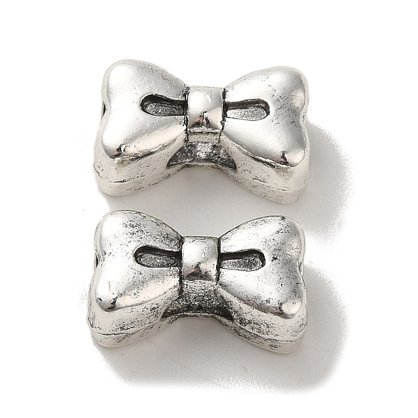 

PandaHall Tibetan Style Alloy Beads, Cadmium Free & Lead Free, Bowknot, Antique Silver, 9x15.5x6.5mm, Hole: 4x6mm, about 454pcs/1000g Alloy...